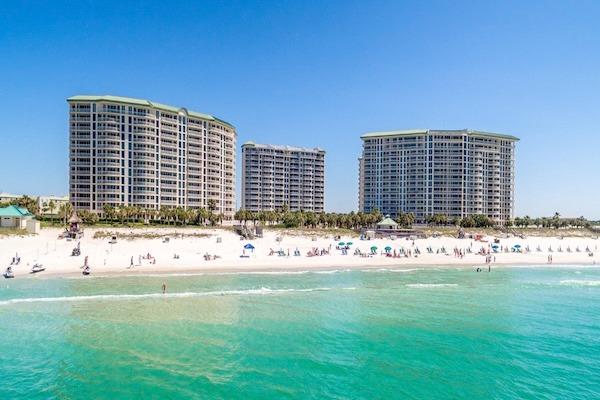 Silver Shells Beach Resort and Spa towers overlooking the beach and Gulf of Mexico in Destin, Florida.